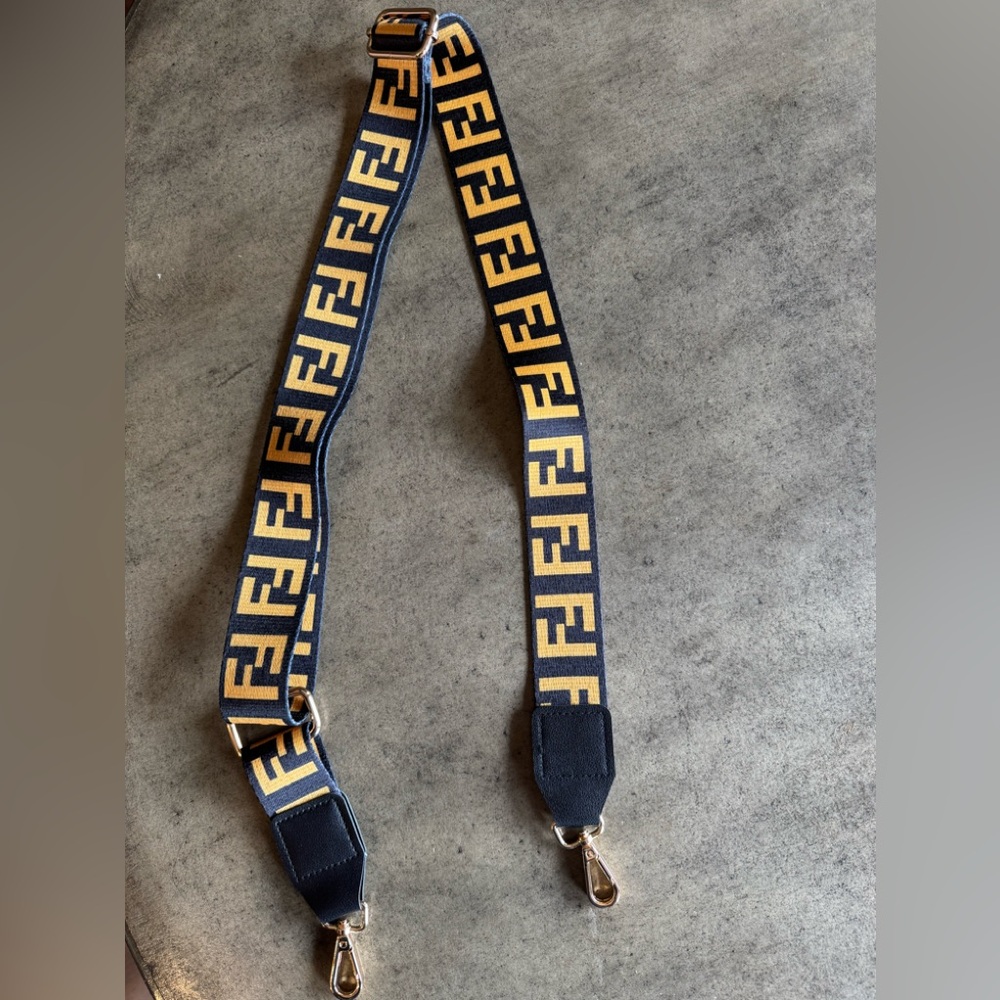 Black and yellow Fendi logo purse strap
